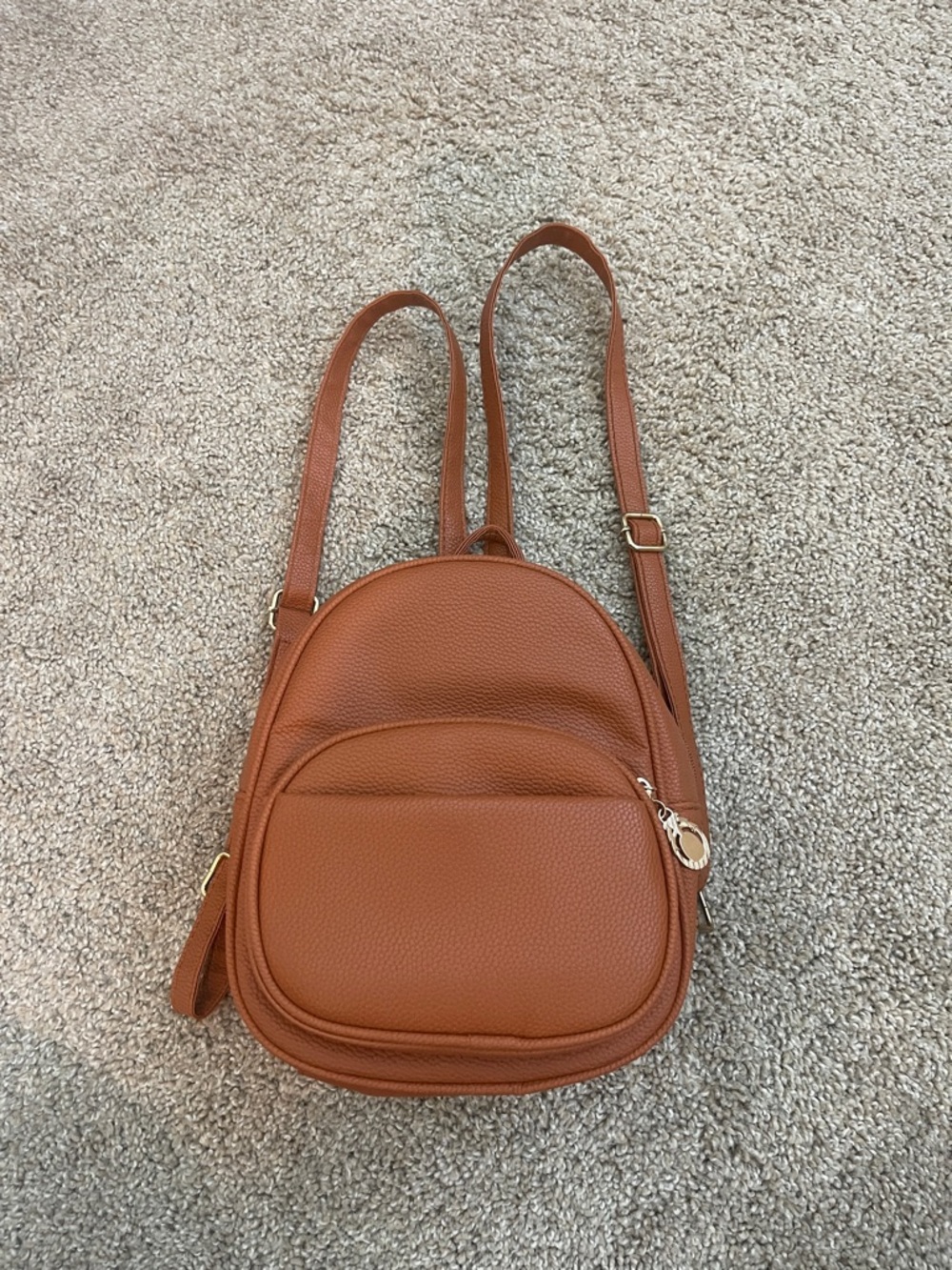 Amazon Pebbled Leather Mini Backpack in Cognac Brown